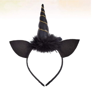 Close-up of black unicorn headband featuring spiral horn and plush base for Halloween