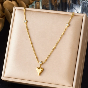 Gold plated stainless steel necklace with heart pendant and sparkling zircon accents