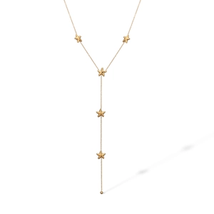 Detail of a gold Y-shaped necklace featuring five polished five-pointed star pendants