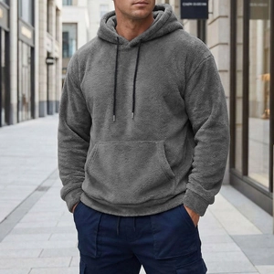 Detail of dark grey coral fleece hoodie showing plush texture and kangaroo pocket