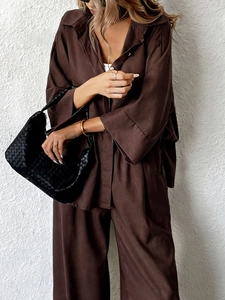 Women's dark brown two-piece linen set with long sleeve shirt and wide leg trousers