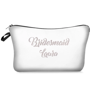 Detail of custom bridesmaid cosmetic bag with pink glitter Laura name and black handle