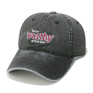 Vintage washed charcoal baseball cap featuring red and white worthy of love embroidery