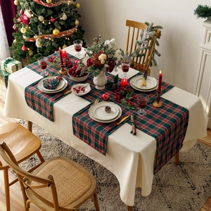 Christmas table runner and placemat set with red and green plaid patterns for decor