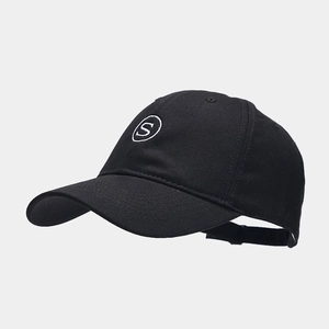 Detailed close-up of white letter S embroidery on a black cotton twill baseball cap