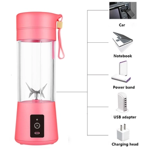 Pink portable electric juicer blender with USB charging icons for car and laptop