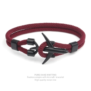 Handmade burgundy braided Milan rope bracelet with a black aircraft-shaped metal clasp