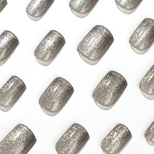 Silver-grey cat eye press-on nails with glitter finish and short square-oval shape