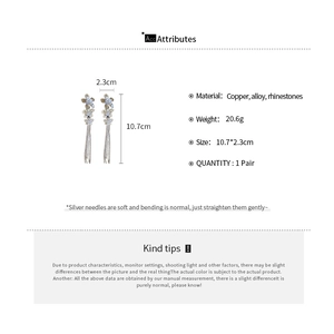 Detailed specs showing silver flower tassel earrings with rhinestone butterfly design
