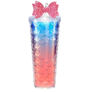 Detail of pink glitter bow accessory on blue and pink mermaid scale textured tumbler