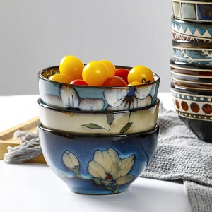 Japanese ceramic rice bowl set with hand-painted floral patterns and reactive glaze finish