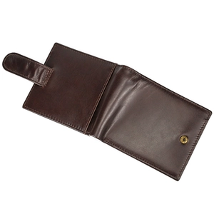 Detail view of open brown leather wallet showing stitching and snap button closure