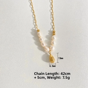 Detail view of pearl necklace with gold water drop pendant showing exact size and length