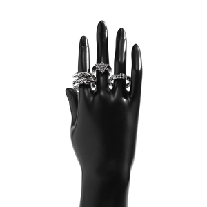 Three-piece silver hip-hop ring set with dragon and hexagram motifs for men on black model