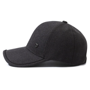 Dark grey textured wool baseball cap for men featuring a metallic shield logo detail