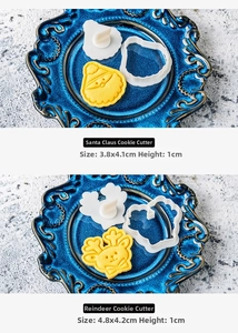 Detail view of Santa and reindeer cookie cutters showing specific size dimensions