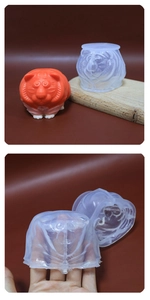 Close-up of flexible tiger silicone mold showing its elastic texture and finished model