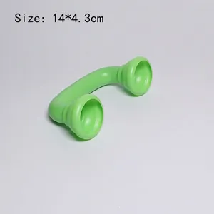 Detailed view of green plastic toy handset for kids showing 14x4.3cm product size