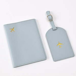 Light blue PU leather passport holder and luggage tag set with golden airplane design