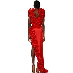 Detailed back view of a red asymmetric evening gown with flowing ruffle cascade detail