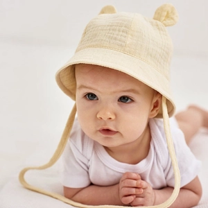 Infant pure cotton sun hat with cute rabbit ears and chin strap in beige color