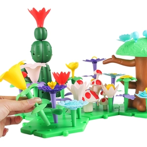 DIY flower garden building blocks toy for kids being assembled on white background