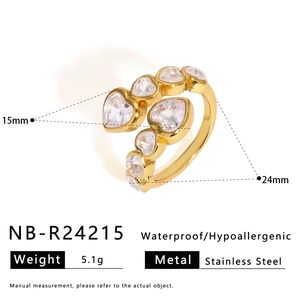 Detail view of gold stainless steel heart ring showing 15mm and 24mm dimensions
