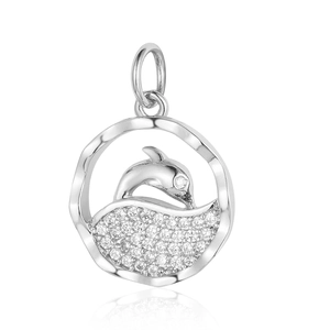 Macro shot of silver dolphin pendant with pavé set cubic zirconia jumping from waves