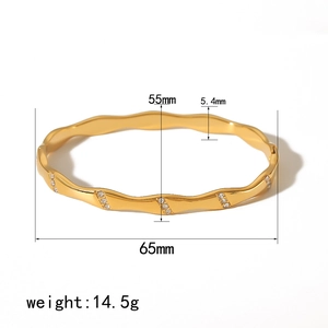 French vintage style 18K gold plated stainless steel wave bangle with white crystals