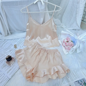 Champagne silk satin two-piece pajama set with V-neck camisole and ruffled shorts