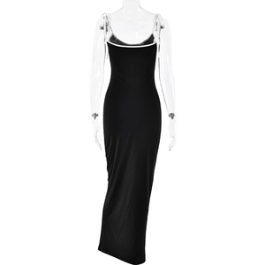 Detail view of a black sleeveless bodycon maxi dress with thin straps on a mannequin