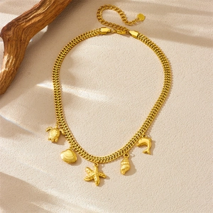 Gold stainless steel ocean series necklace with sea turtle and starfish charms