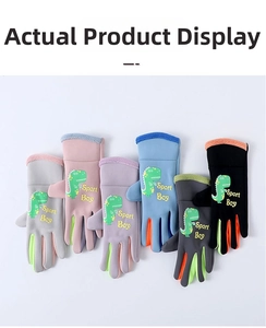 Detailed view of colorful kids winter ski gloves with cartoon dinosaur dinosaur print