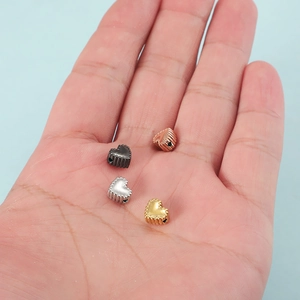 Textured stainless steel heart-shaped beads in silver, gold, rose gold and black colors