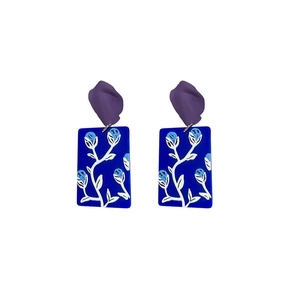 Artistic painted flower drop earrings featuring purple matte finish and blue floral patterns