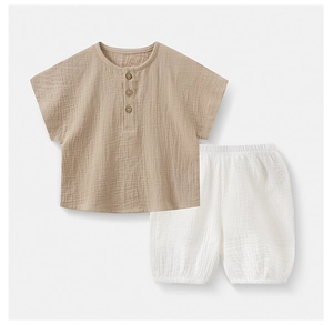 Macro shot of cotton gauze texture and wooden buttons on kids casual pajamas set