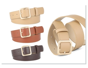 Detailed close-up of PU leather belts with golden square buckles in beige and brown
