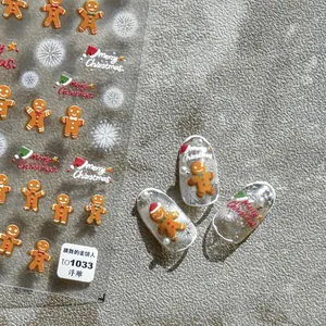 Detailed 3D embossed Christmas gingerbread man and snowflake nail art stickers for holiday