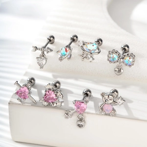 Silver bow heart and bear cartilage studs with pink and aurora zircon accents