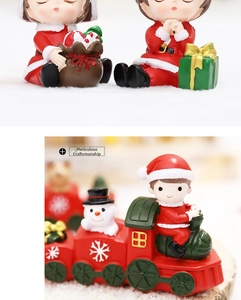 Detailed Christmas train with snowman figurines and festive miniature characters decor