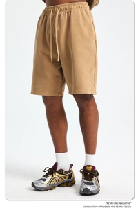 Detailed view of khaki 420g cotton sweat shorts with adjustable drawstring waistband