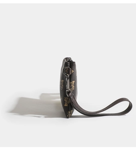 Side view of brown litchi pattern PU leather wristlet wallet with a secure zipper closure