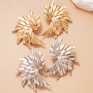 Minimalist spiral leaf metal stud earrings in polished gold and silver finish