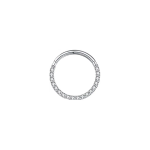 Close-up of F136 titanium clicker hoop ring with sparkling zircon inlay for piercing