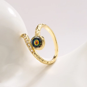 Gold plated open ring with evil eye geometric design and textured hammer finish stones