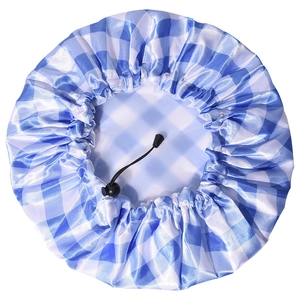 Adjustable waterproof shower cap with blue and white plaid pattern and PEVA lining