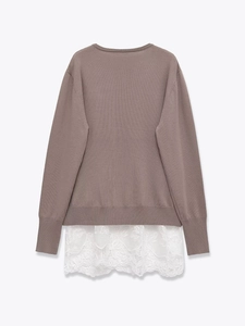 Detail of taupe knit sweater showing floral lace hem and soft knit texture