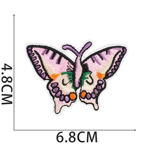 Pink and purple embroidered butterfly patch measuring 6.8cm x 4.8cm on white background