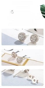 Macro detail of round halo cubic zirconia stud earrings with polished silver finish