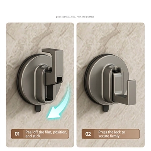 Strong suction cup wall hook in dark grey finish showing two-step locking installation